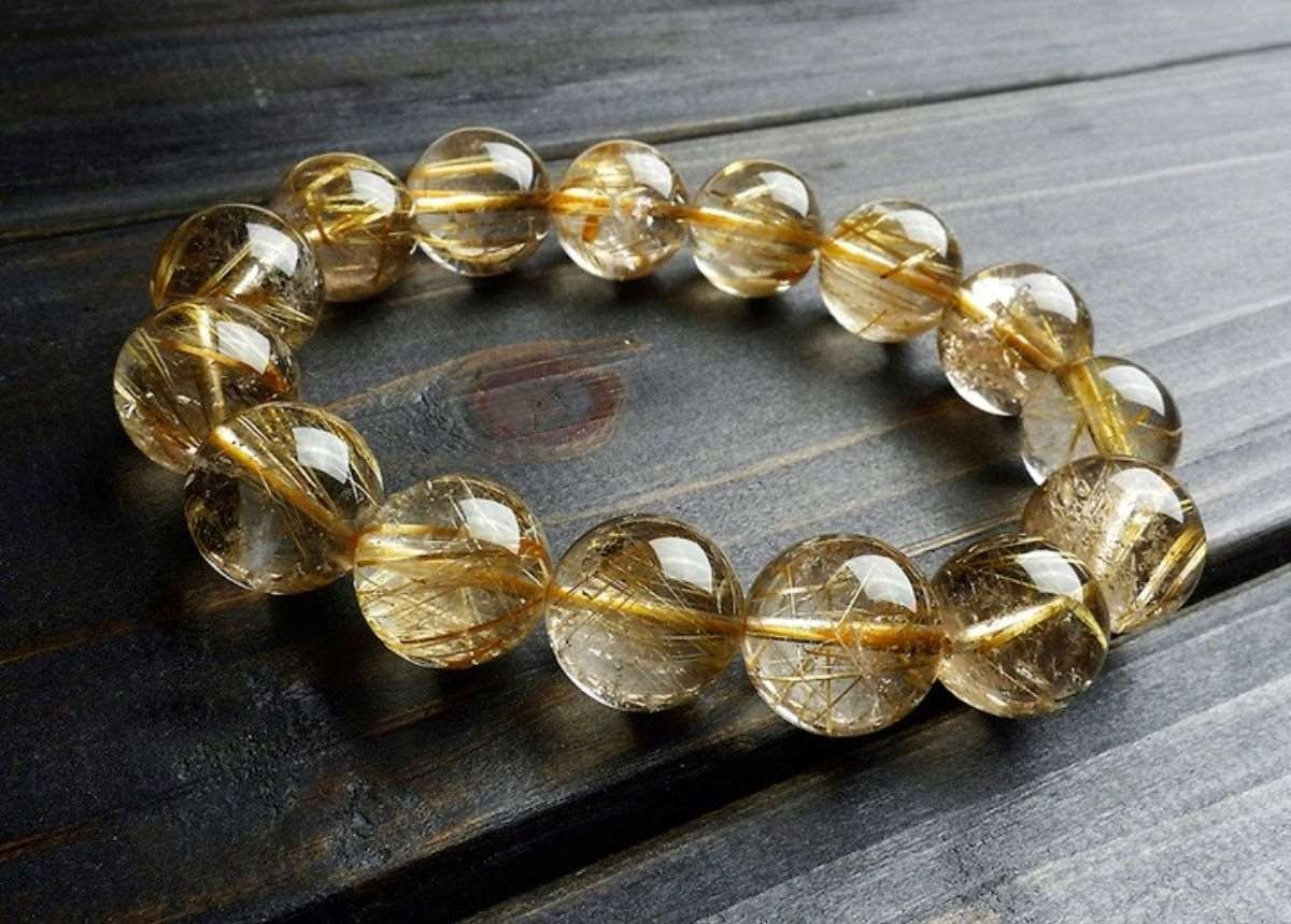 Tuổi Canh Tuất 1970 nên chọn vòng tay đá thiên nhiên màu vàng như thạch anh tóc vàng