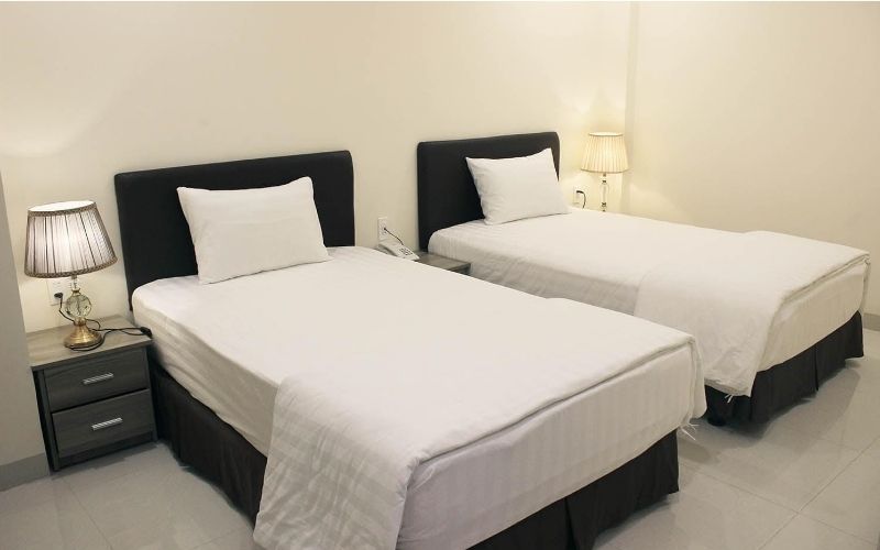 Không gian nghỉ ngơi đầy đủ tiện nghi tại Deluxe Hotel